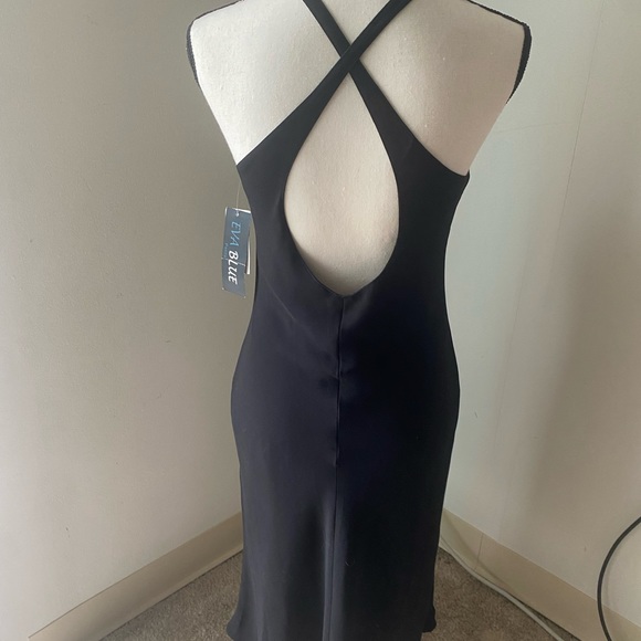 New with tags Classy black dress T length size 8. - Picture 2 of 5